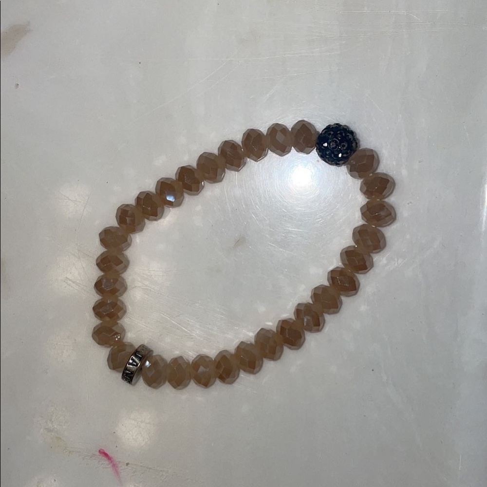 tan bracelet with a shine